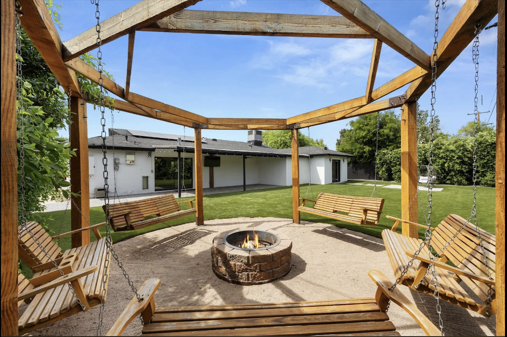 Backyard outdoor living area designed for gathering and entertaining